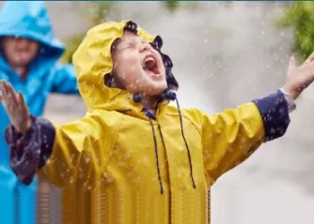 Toddler in yellow rainwear